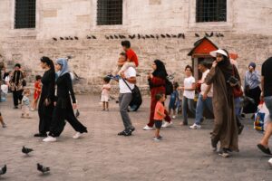 People walking through a busy street in Istanbul, reflecting everyday cultural diversity